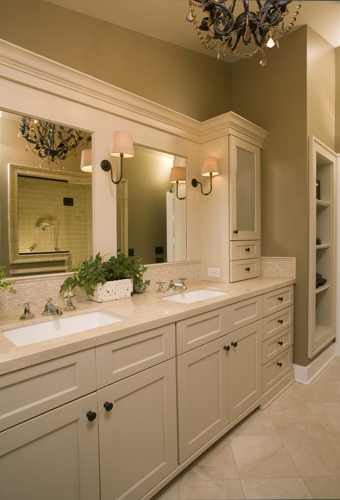 Bathroom - traditional beige tile bathroom idea in Seattle with an undermount sink, shaker cabinets, beige cabinets and beige countertops