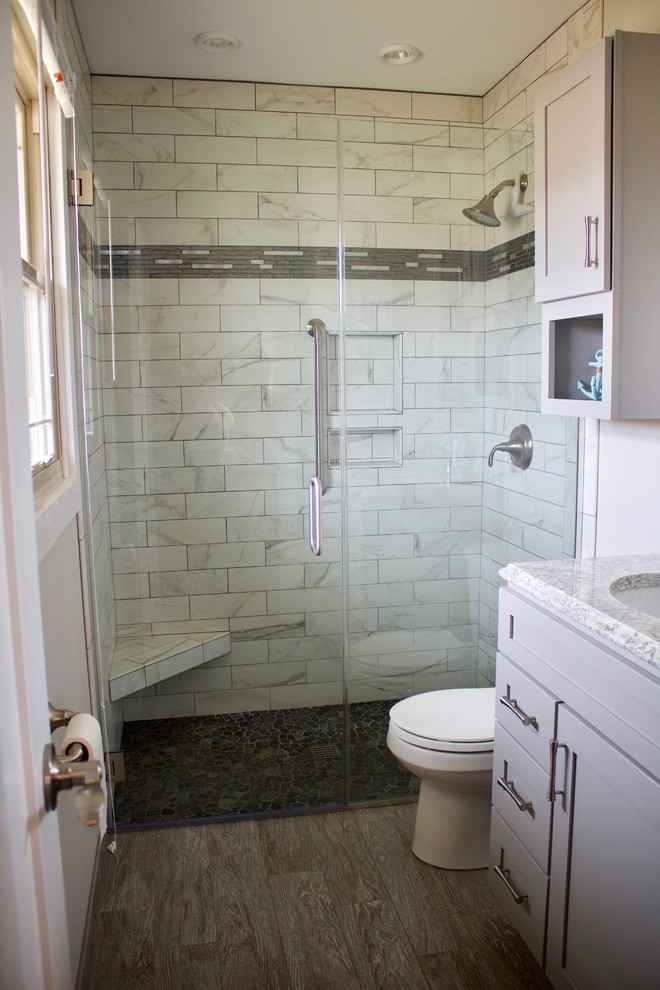 Example of a small transitional master white tile and porcelain tile porcelain tile and gray floor alcove shower design in Chicago with shaker cabinets, gray walls, an undermount sink, quartzite countertops and a hinged shower door