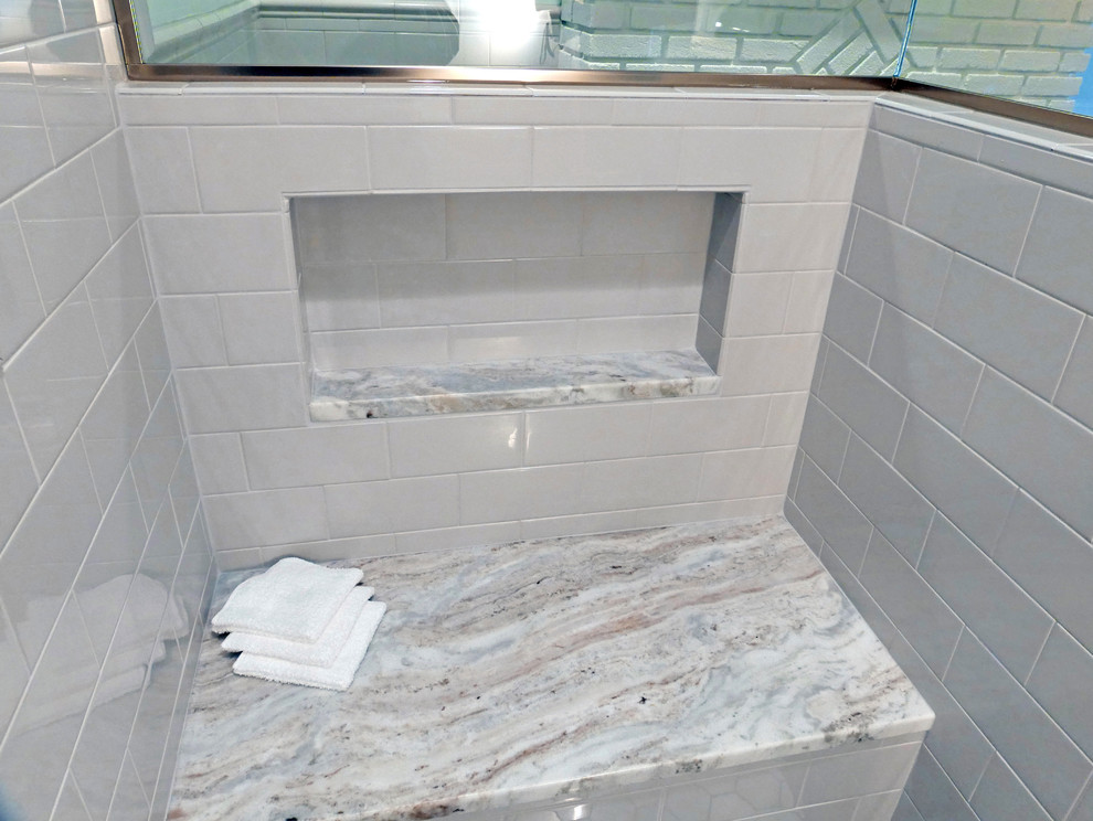 Example of a mid-sized classic master gray tile and subway tile porcelain tile corner shower design in Cleveland with furniture-like cabinets, dark wood cabinets, a two-piece toilet, green walls, an undermount sink and granite countertops