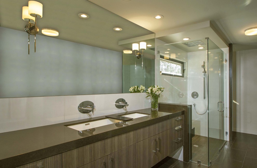 Mid-sized trendy master yellow tile and porcelain tile porcelain tile and brown floor walk-in shower photo in San Diego with an undermount sink, flat-panel cabinets, medium tone wood cabinets, quartz countertops, gray walls and a hinged shower door