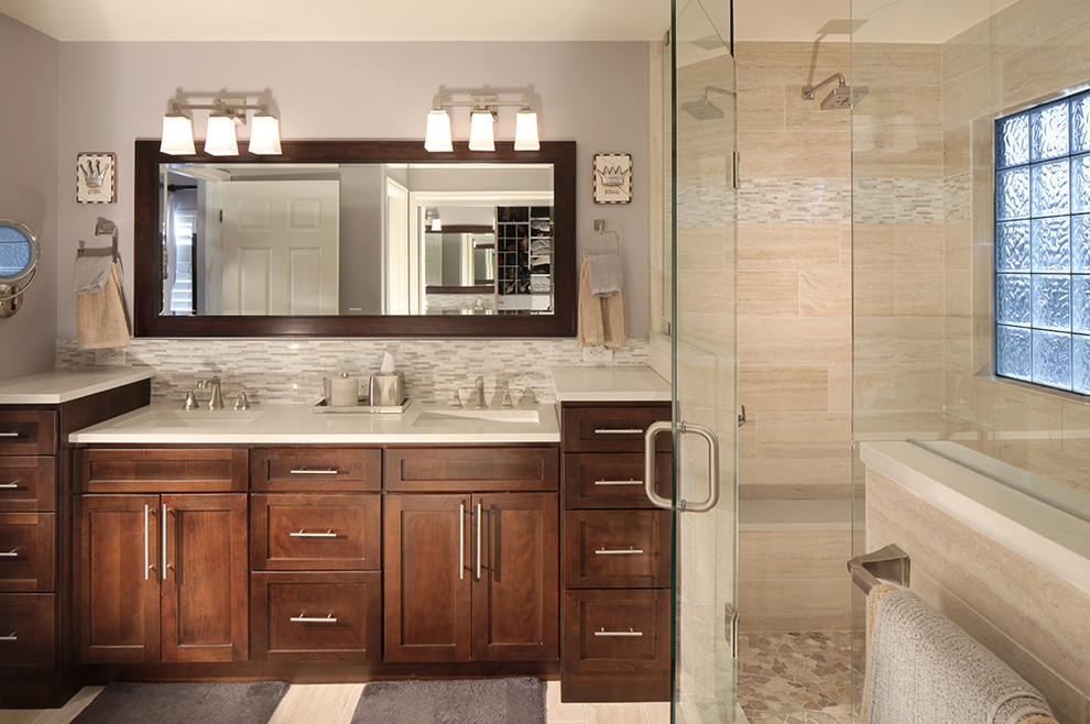 Double shower - mid-sized transitional master beige tile and ceramic tile travertine floor double shower idea in Denver with recessed-panel cabinets, medium tone wood cabinets, beige walls, an undermount sink and quartz countertops