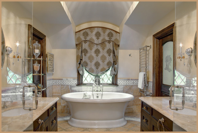 Example of a large classic master white tile and stone slab marble floor freestanding bathtub design in San Francisco with an undermount sink, furniture-like cabinets, dark wood cabinets, onyx countertops and beige walls