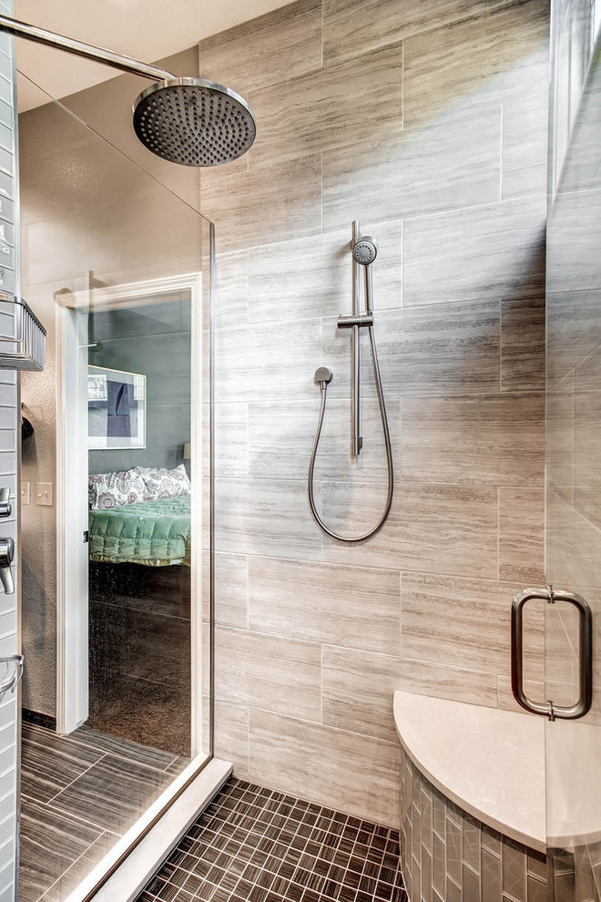 Inspiration for an expansive contemporary ensuite bathroom in Denver with a submerged sink, shaker cabinets, dark wood cabinets, engineered stone worktops, a corner shower, a two-piece toilet, beige tiles, ceramic tiles, beige walls and ceramic flooring.