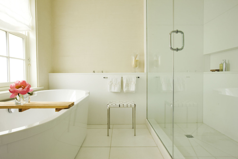 Photo of a contemporary bathroom in New York with a freestanding bath.