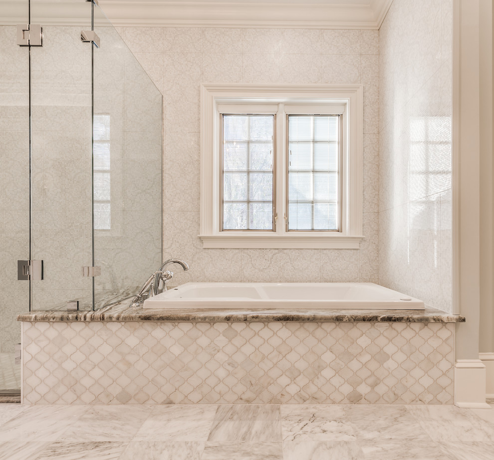 Bathroom - large traditional master white tile and stone tile marble floor bathroom idea in Jacksonville with beaded inset cabinets, white cabinets, blue walls, granite countertops and an undermount sink