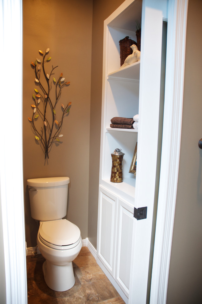 Mid-sized transitional master mosaic tile and brown tile porcelain tile bathroom photo in Other with white cabinets, an undermount sink, beige walls, raised-panel cabinets and a two-piece toilet