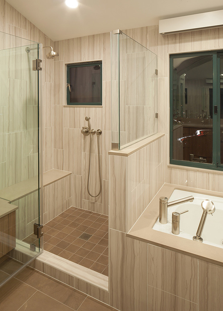 Design ideas for an expansive contemporary ensuite bathroom in San Francisco with flat-panel cabinets, brown cabinets, a submerged bath, a corner shower, a one-piece toilet, beige tiles, porcelain tiles, beige walls, porcelain flooring, a submerged sink, engineered stone worktops, brown floors, a hinged door and brown worktops.