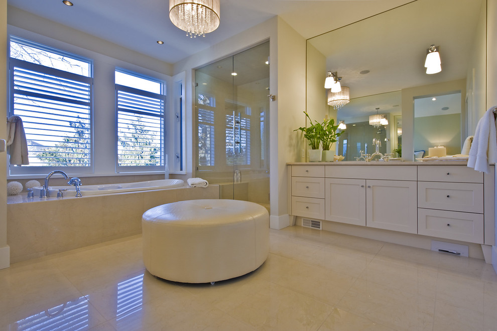 Inspiration for a contemporary bathroom remodel in Vancouver with marble countertops