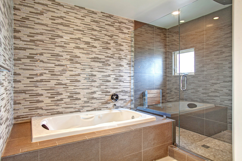 Photo of a medium sized traditional ensuite bathroom in San Diego with a submerged sink, shaker cabinets, medium wood cabinets, limestone worktops, a built-in bath, a walk-in shower, grey tiles, mosaic tiles, grey walls and ceramic flooring.