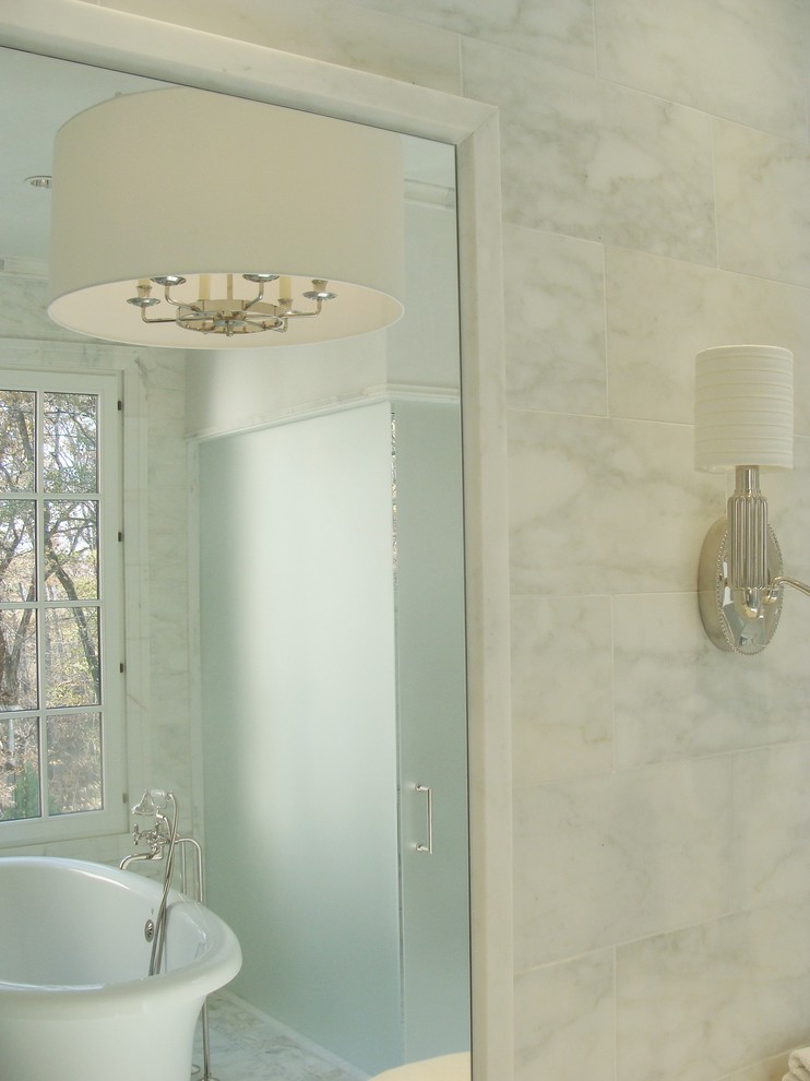 This is an example of a traditional bathroom in Atlanta with a freestanding bath.