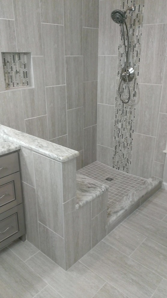 Medium sized contemporary ensuite bathroom in Austin with beaded cabinets, a corner shower, grey tiles, porcelain tiles and porcelain flooring.