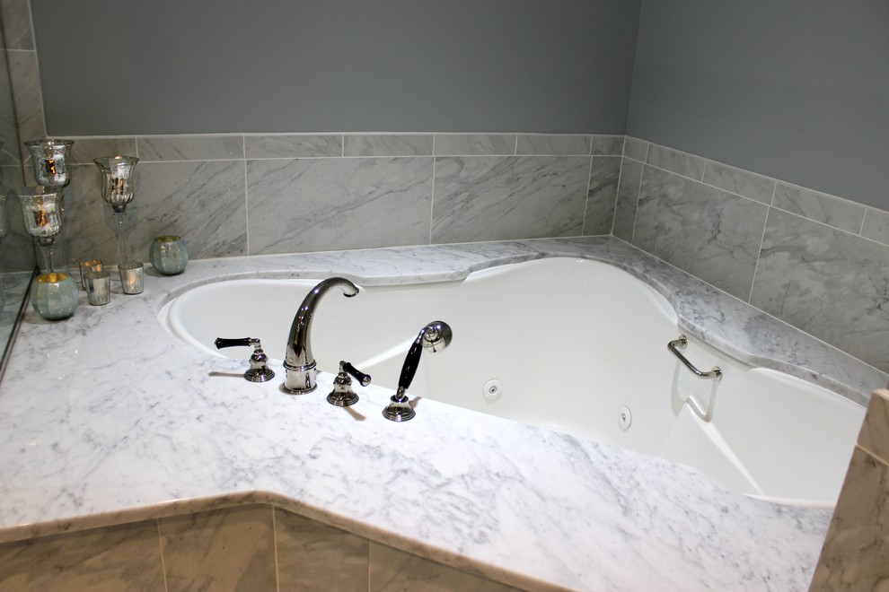 Master Bathroom Corner Whirlpool Tub with Carrera Marble Surround