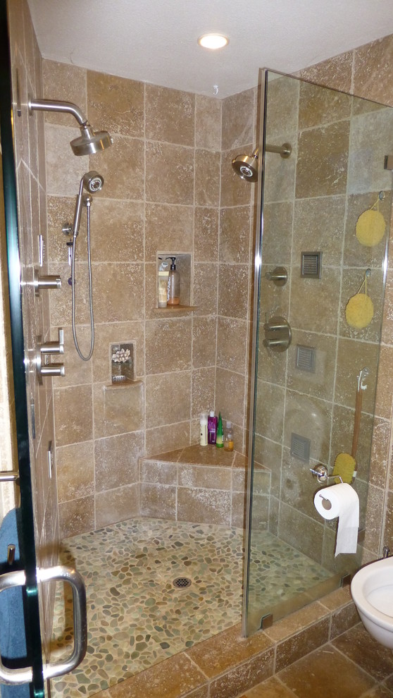 Inspiration for a mid-sized tropical master beige tile and stone tile travertine floor alcove shower remodel in San Diego