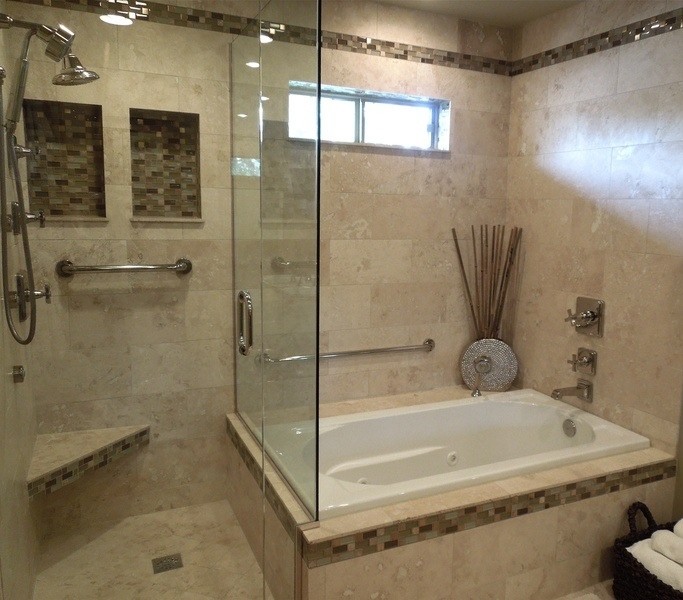 Example of a mid-sized minimalist 3/4 limestone floor and beige floor bathroom design in New Orleans with shaker cabinets, dark wood cabinets, a two-piece toilet, brown walls, a drop-in sink, solid surface countertops and a hinged shower door