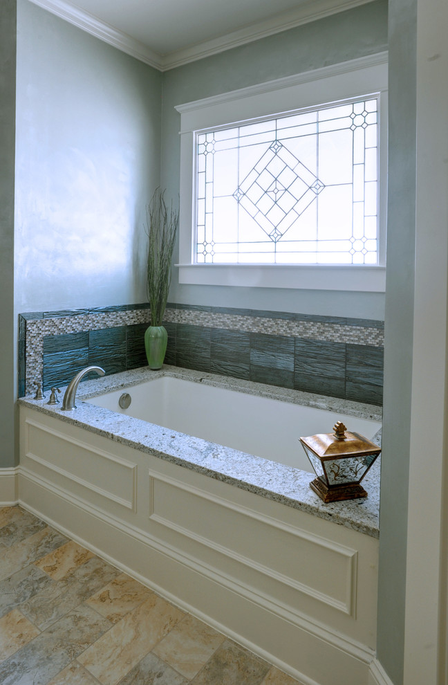 Inspiration for a large transitional master alcove bathtub remodel in Other