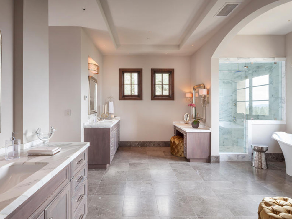 Idées déco pour une grande salle de bain principale classique en bois brun avec une douche ouverte, un carrelage beige, un carrelage de pierre, un mur beige, un sol en travertin, un lavabo encastré, un plan de toilette en marbre et un placard avec porte à panneau encastré.