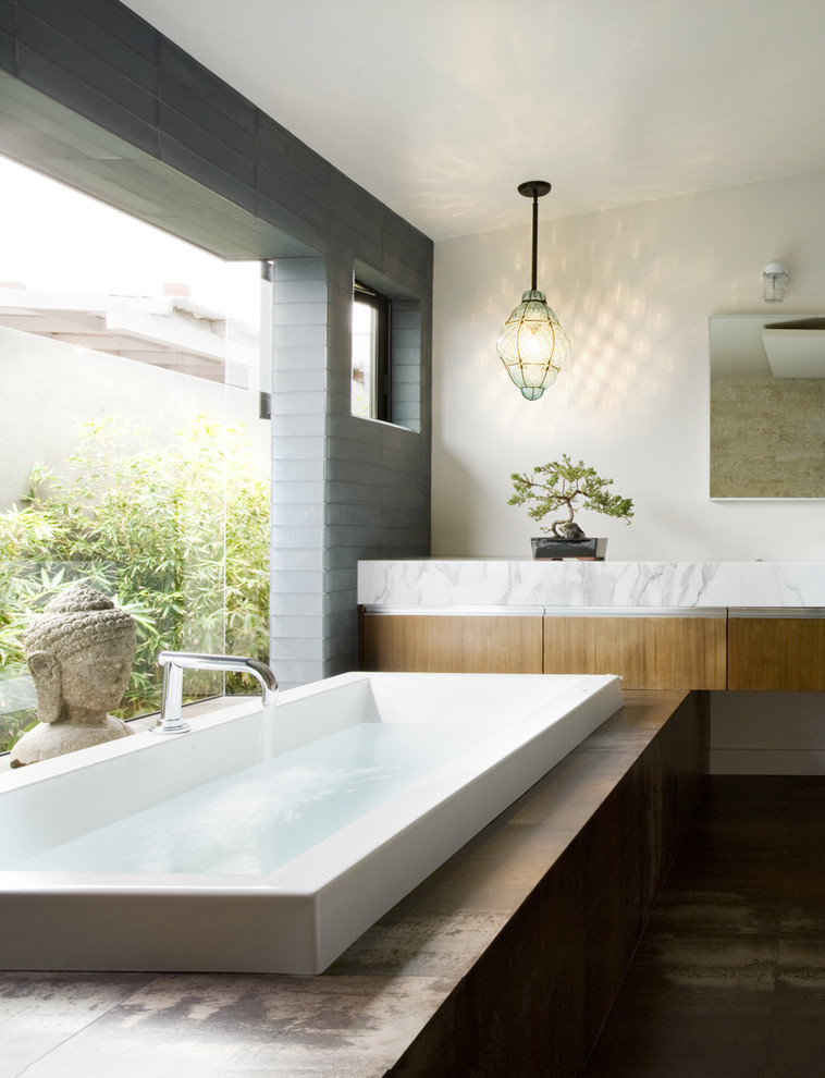 Inspiration for a 1950s bathroom remodel in Orange County with marble countertops