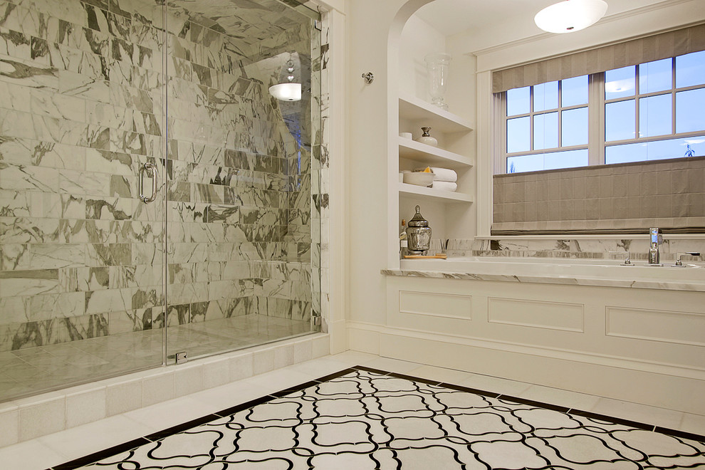 Design ideas for a traditional ensuite bathroom in Seattle with marble worktops, white walls, marble flooring and a built-in bath.