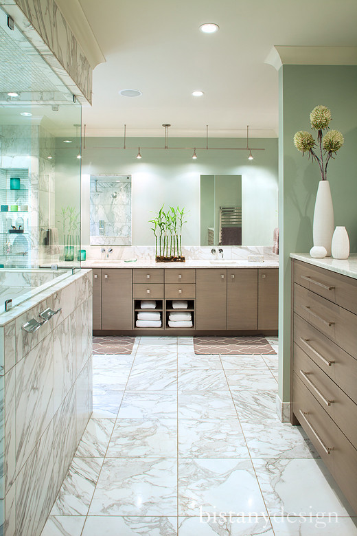 This is an example of a large modern bathroom in Charlotte with grey cabinets, a submerged sink, flat-panel cabinets, granite worktops, white tiles, stone tiles, green walls and marble flooring.