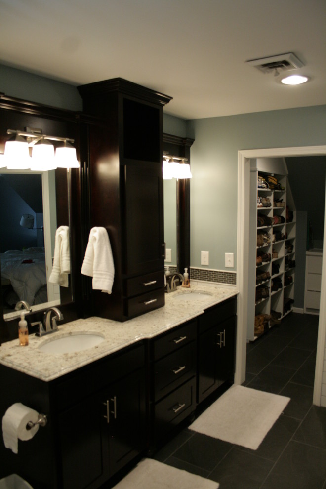 Inspiration for a medium sized traditional bathroom in Kansas City with a submerged sink, recessed-panel cabinets, black cabinets, granite worktops, a double shower, black tiles, ceramic tiles, grey walls and ceramic flooring.