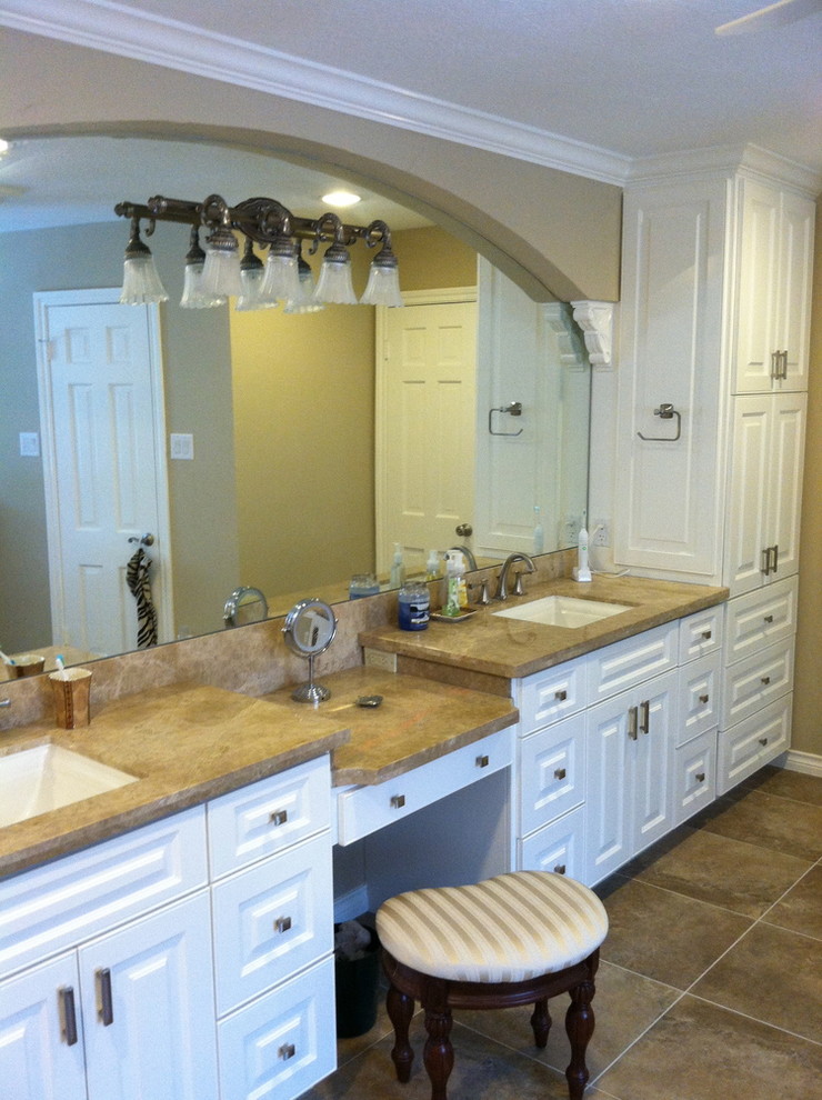 Design ideas for a large classic ensuite bathroom in Houston with white cabinets, brown tiles and beige walls.