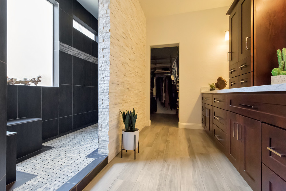 Design ideas for a large contemporary ensuite bathroom in Phoenix with flat-panel cabinets, brown cabinets, a walk-in shower, black tiles, porcelain tiles, porcelain flooring, a submerged sink, quartz worktops, brown floors and an open shower.