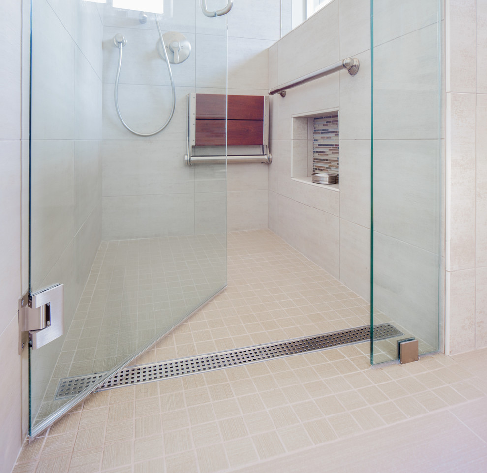 Medium sized classic shower room bathroom in San Diego with a submerged sink, raised-panel cabinets, medium wood cabinets, engineered stone worktops, a built-in shower, a two-piece toilet, multi-coloured tiles, glass tiles, beige walls and porcelain flooring.
