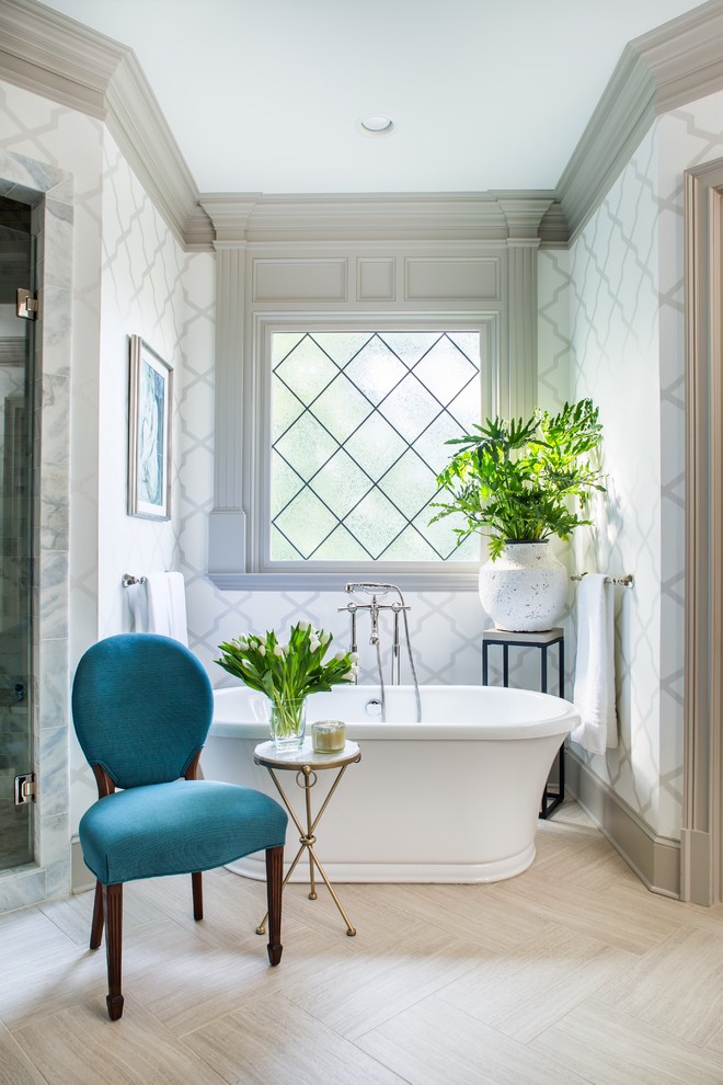 Inspiration for a mid-sized timeless master light wood floor freestanding bathtub remodel in Atlanta with white walls