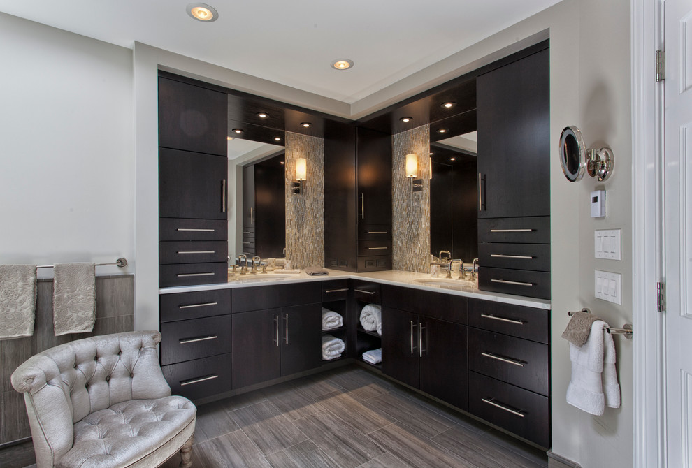 Design ideas for a large contemporary ensuite bathroom in New York with a submerged sink, flat-panel cabinets, dark wood cabinets, marble worktops, a freestanding bath, a walk-in shower, a two-piece toilet, metal tiles, brown walls, porcelain flooring and beige tiles.