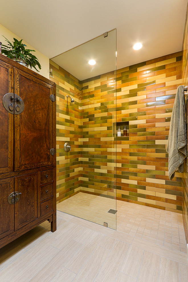 Walk-in shower - traditional master multicolored tile and ceramic tile porcelain tile walk-in shower idea in Phoenix with recessed-panel cabinets, yellow walls, an undermount sink and limestone countertops