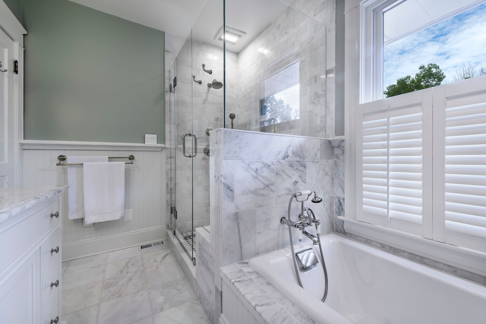 Bathroom - mid-sized traditional master white tile and subway tile marble floor bathroom idea in Cincinnati with white cabinets, marble countertops, green walls, an undermount sink, recessed-panel cabinets and a two-piece toilet
