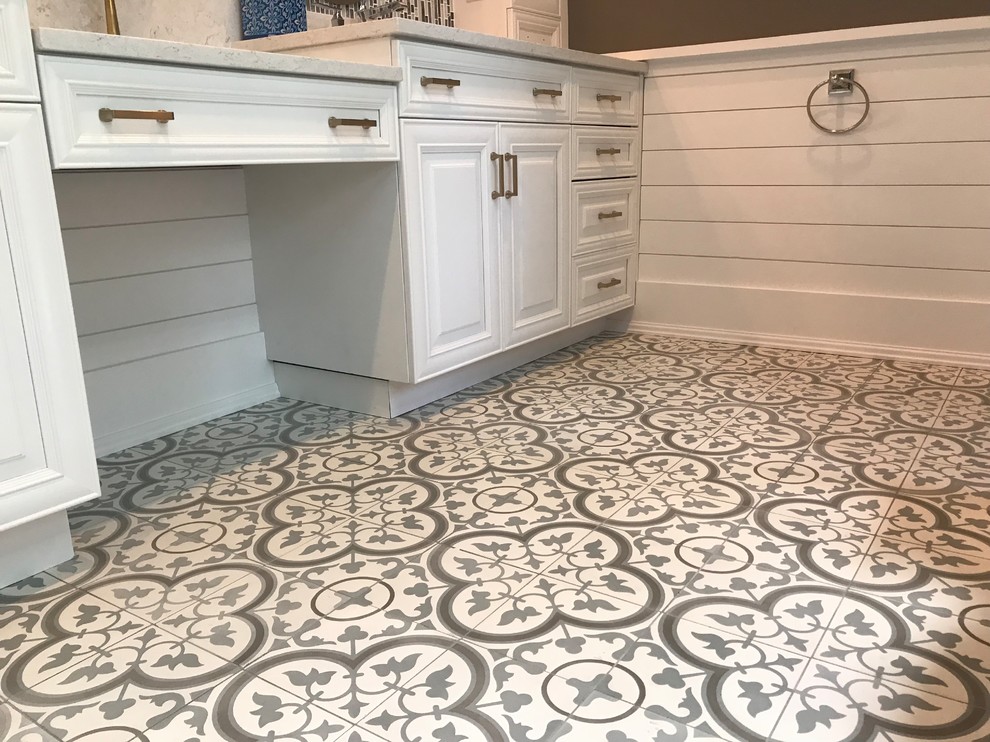 Inspiration for a mid-sized contemporary master gray tile and porcelain tile ceramic tile and multicolored floor bathroom remodel in New York with raised-panel cabinets, white cabinets, brown walls, an undermount sink, a hinged shower door and beige countertops