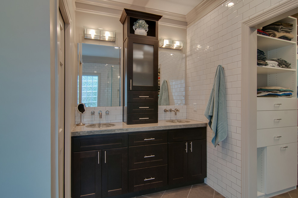 Design ideas for a medium sized modern ensuite bathroom in Nashville with an integrated sink, shaker cabinets, dark wood cabinets, concrete worktops, a freestanding bath, a built-in shower, a one-piece toilet, white tiles, ceramic tiles, grey walls and ceramic flooring.