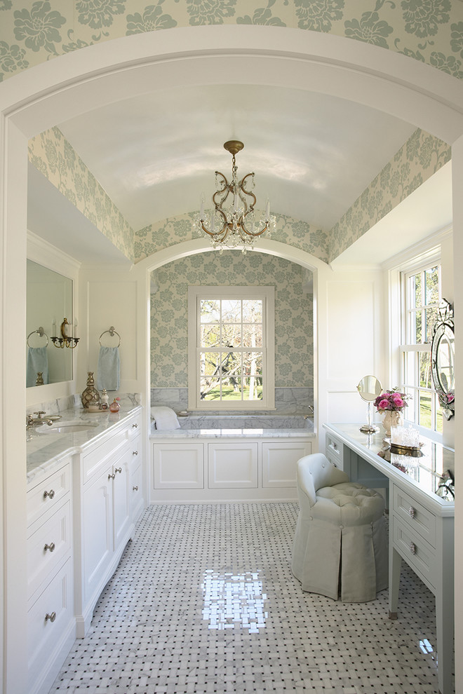 Inspiration for a large timeless master marble floor alcove bathtub remodel in Minneapolis with marble countertops, shaker cabinets, white cabinets, white walls, an undermount sink and gray countertops