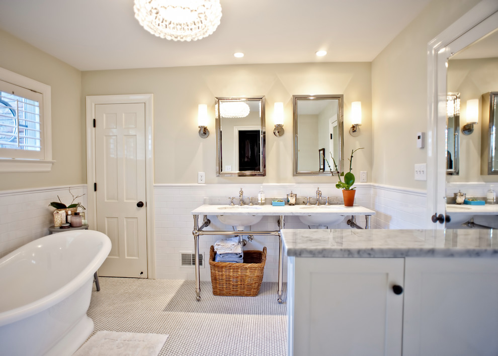 Example of a mid-sized classic master white tile and subway tile ceramic tile freestanding bathtub design in Louisville with shaker cabinets, white cabinets, marble countertops and a console sink