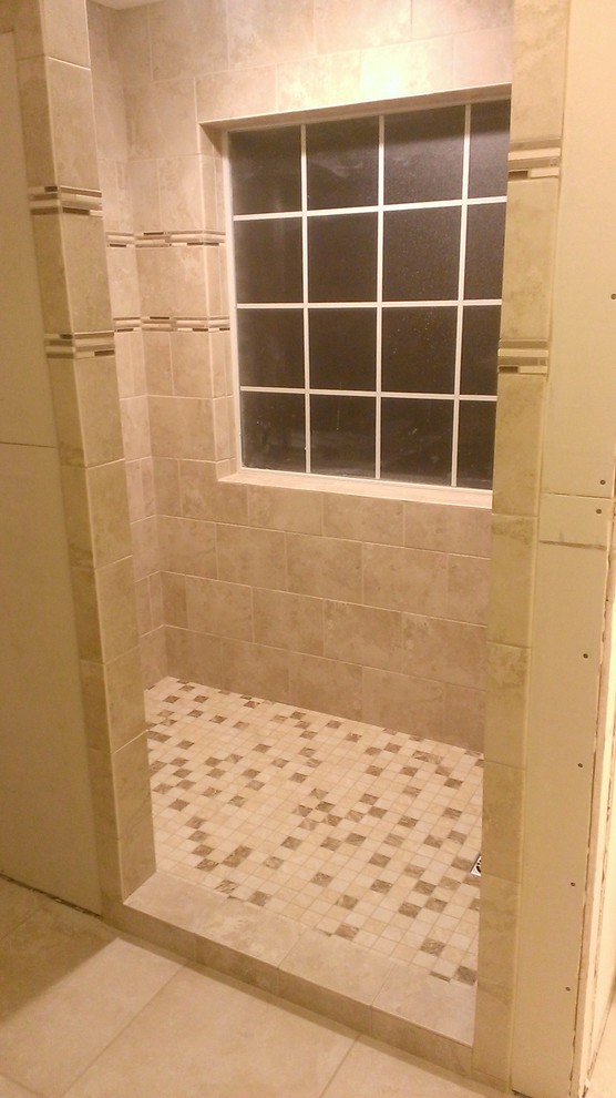 Example of a trendy beige tile and ceramic tile double shower design in Austin