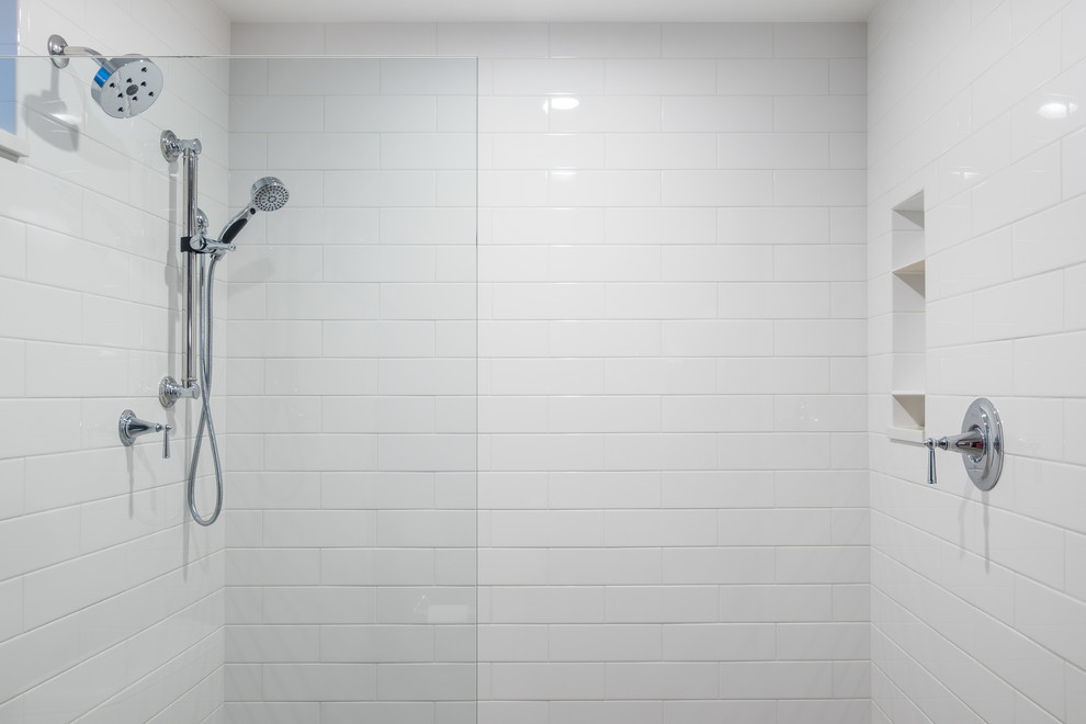 Example of a mid-sized classic master white tile and ceramic tile porcelain tile bathroom design in Portland with recessed-panel cabinets, white cabinets, a two-piece toilet, blue walls, an undermount sink and quartz countertops