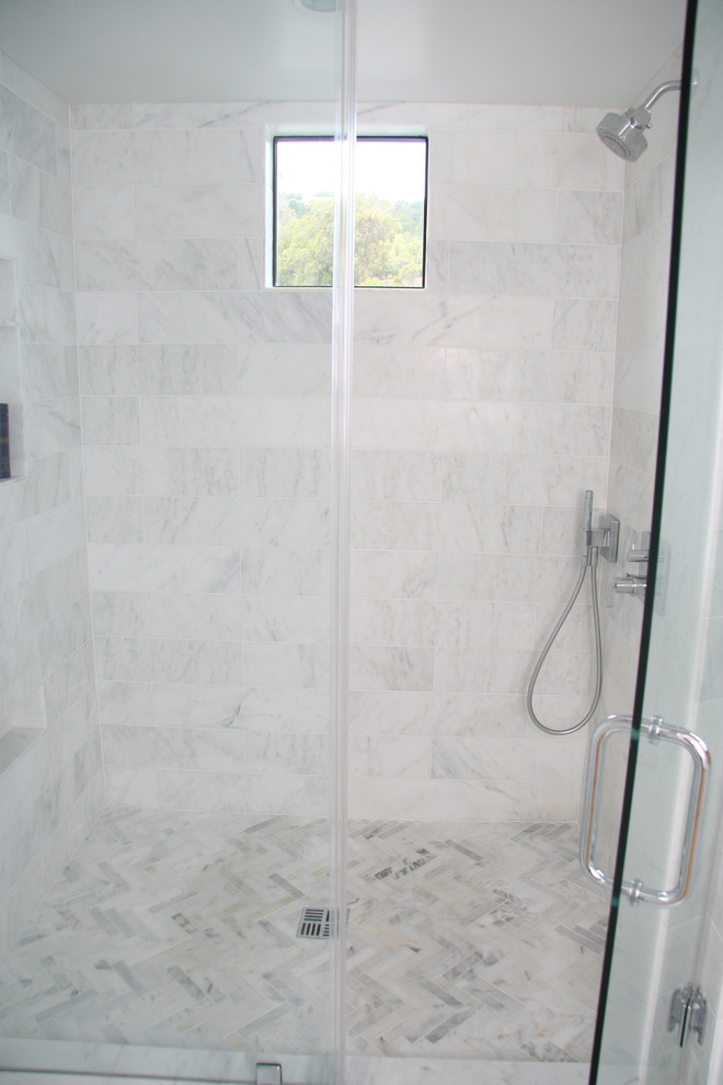 Mid-sized trendy master white tile and stone tile marble floor doorless shower photo in San Francisco with white walls