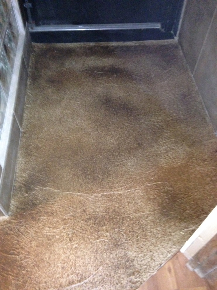 Imagen de cuarto de baño industrial pequeño con suelo de cemento
