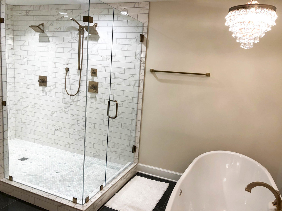Large classic ensuite bathroom in Other with raised-panel cabinets, white cabinets, a freestanding bath, a built-in shower, white tiles, ceramic tiles, slate flooring, a submerged sink, engineered stone worktops, grey floors, a hinged door and white worktops.