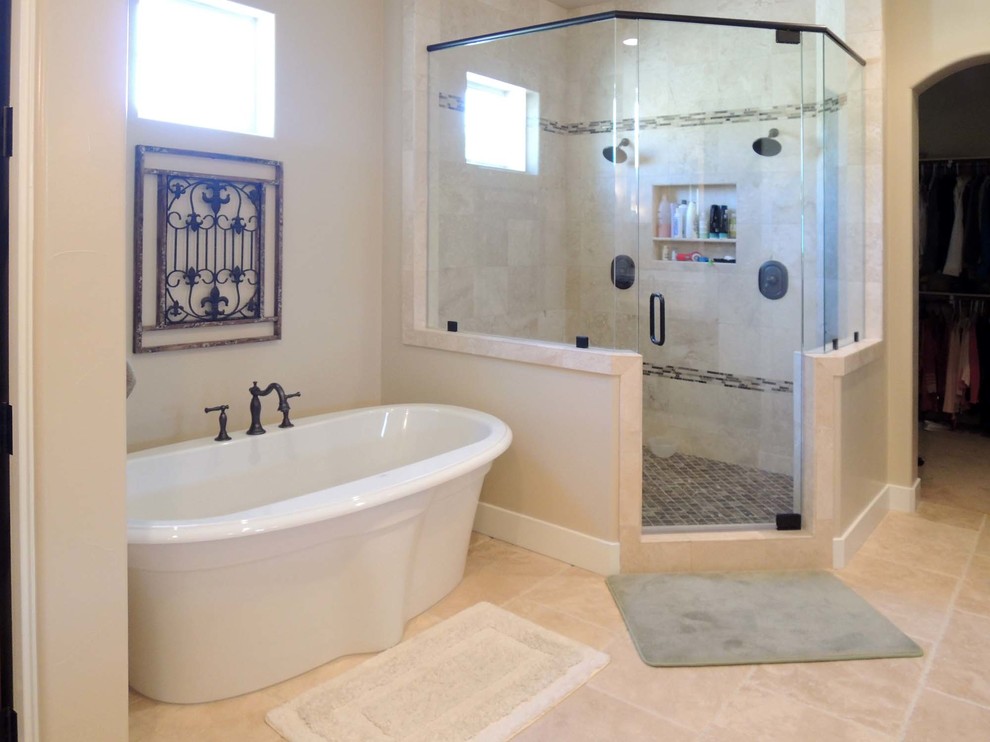 Inspiration for a large traditional ensuite bathroom in Other with a submerged sink, raised-panel cabinets, dark wood cabinets, granite worktops, a freestanding bath, a corner shower, multi-coloured tiles, matchstick tiles, white walls and travertine flooring.