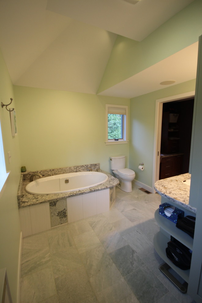 Small beach style master white tile and ceramic tile marble floor bathroom photo in Boston with an undermount sink, shaker cabinets, green cabinets, quartz countertops, a one-piece toilet and green walls
