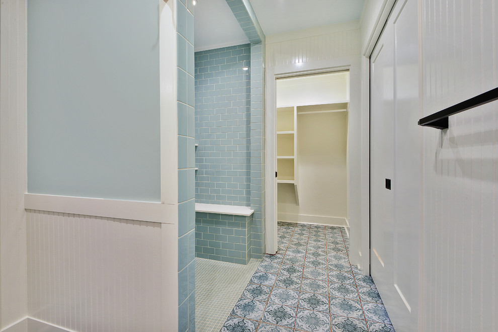 Medium sized modern ensuite bathroom in New Orleans with shaker cabinets, dark wood cabinets, a built-in shower, a two-piece toilet, white tiles, metro tiles, multi-coloured walls, porcelain flooring, a submerged sink, quartz worktops, multi-coloured floors and an open shower.