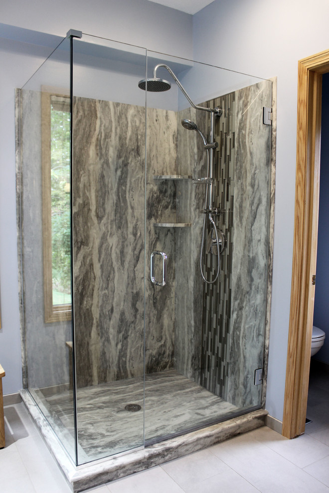 Design ideas for a medium sized traditional ensuite bathroom in Cleveland with a freestanding bath, a corner shower, grey tiles, glass tiles, blue walls, a submerged sink, engineered stone worktops and a hinged door.