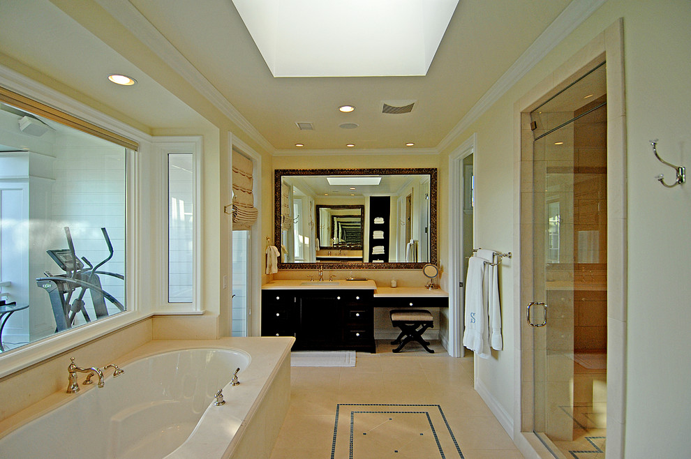 Photo of a classic bathroom in Los Angeles with an alcove bath and a submerged sink.