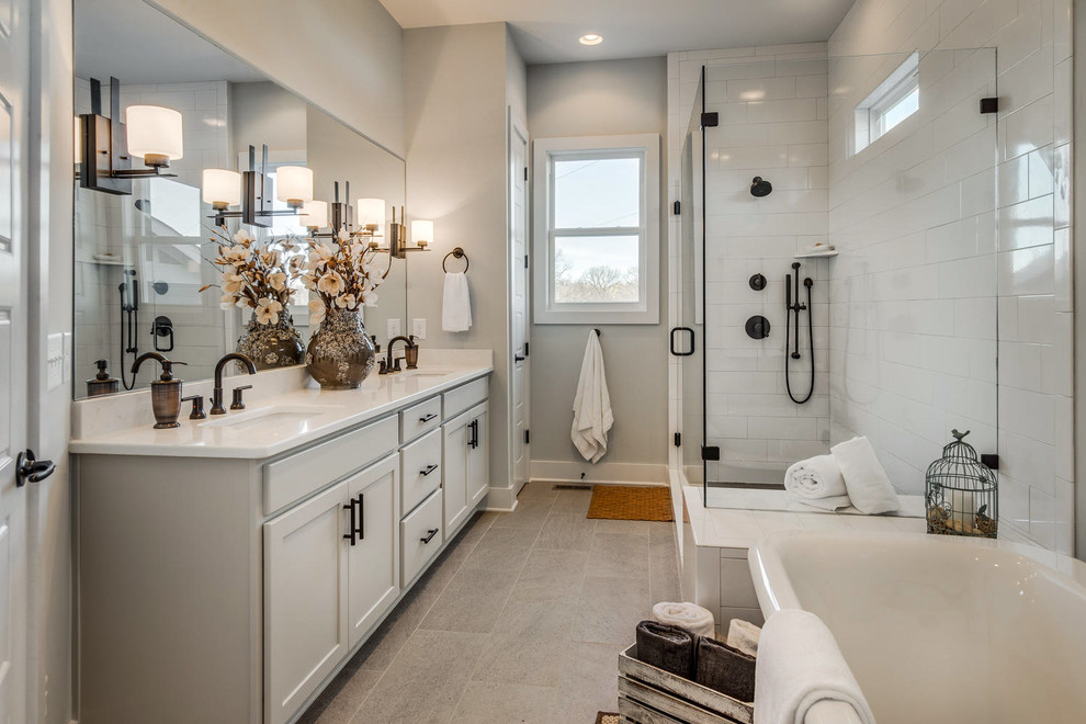 Master Bathroom With Oversized Subway Tiles and Oiled Bronze Fixtures