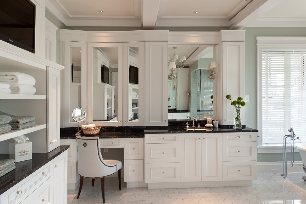 Photo of a large classic ensuite bathroom in Tampa with recessed-panel cabinets, white cabinets, green walls, marble flooring, a submerged sink, engineered stone worktops and white floors.
