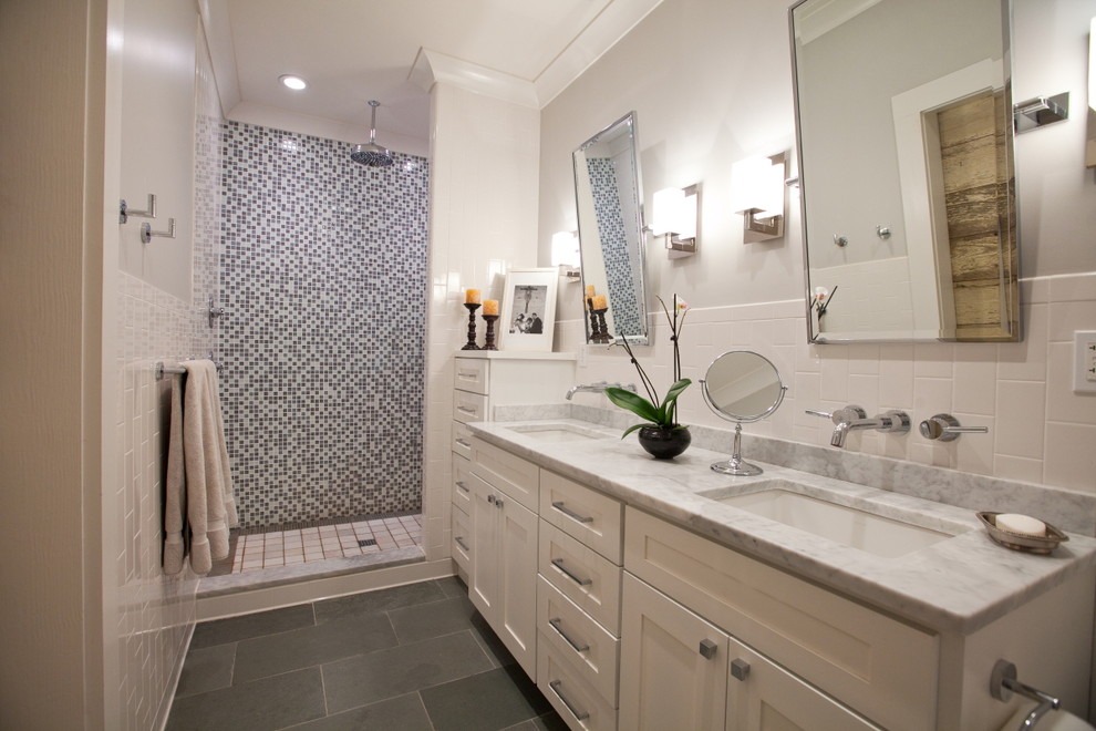 Design ideas for a medium sized contemporary ensuite bathroom in New York with shaker cabinets, white cabinets, a walk-in shower, a two-piece toilet, white tiles, metro tiles, white walls, limestone flooring, a submerged sink and marble worktops.