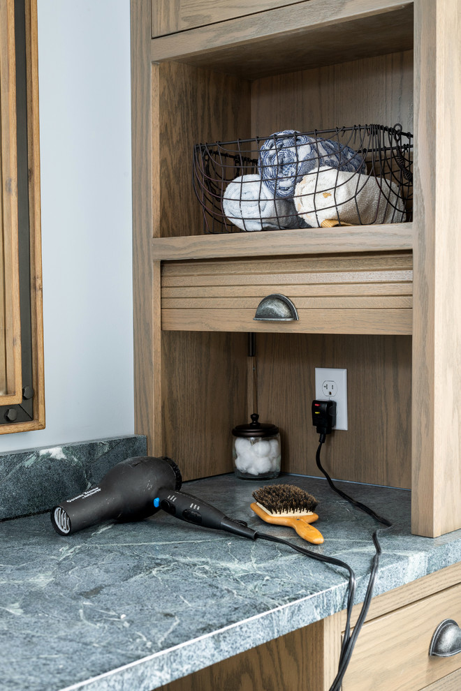 Inspiration for a large transitional master porcelain tile and multicolored floor bathroom remodel in Other with shaker cabinets, medium tone wood cabinets, blue walls, a vessel sink, marble countertops, a hinged shower door and blue countertops