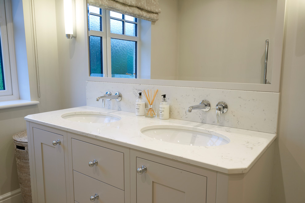 Ensuite bathroom in Other with recessed-panel cabinets, grey cabinets, a walk-in shower, a one-piece toilet, grey walls, quartz worktops and an open shower.